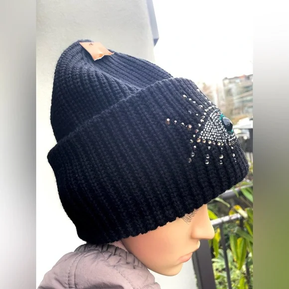 Black Beanie with Eye Design by Kurt Geiger.
NWOT - Picture 13 of 17